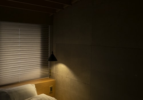 Bedroom with white blinds
