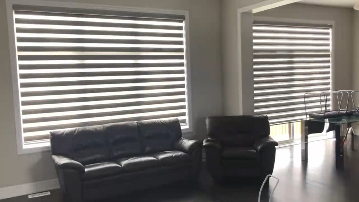 Video: motorized zebra shades lowering in a living room